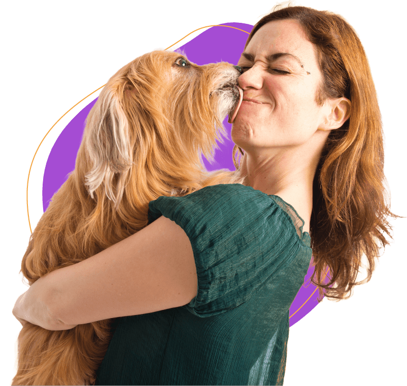 Smiley girl with her dog playing